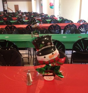 Mini foil balloon snowman heads in containers from Burton and Burton make Great Centerpieces, and gifts for the employees after the party!