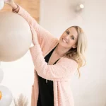 Sara building organic balloons