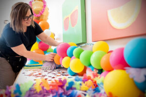 Photo of Melissa Vinson creating garland