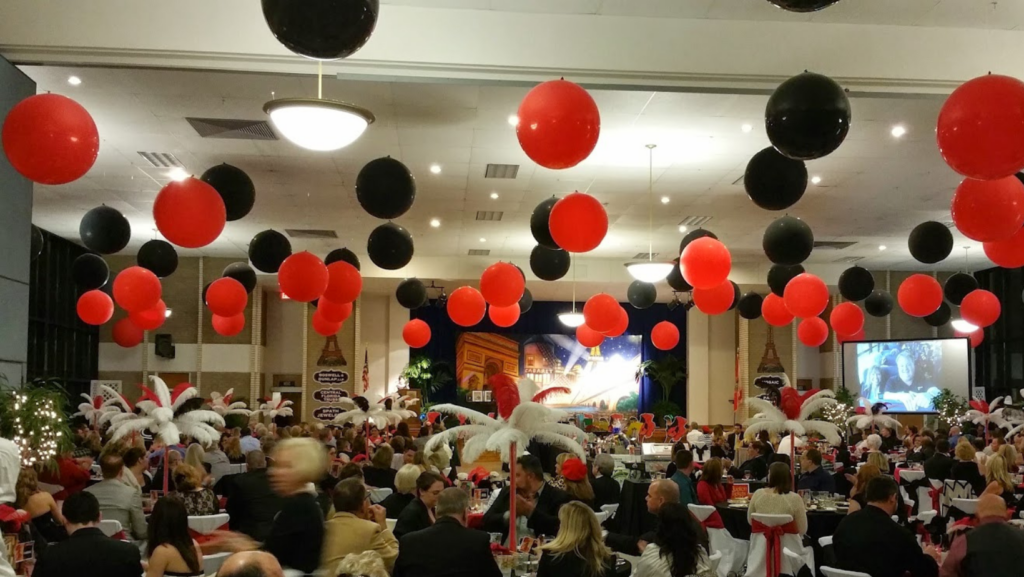 black red and red balloons on the ceiling
